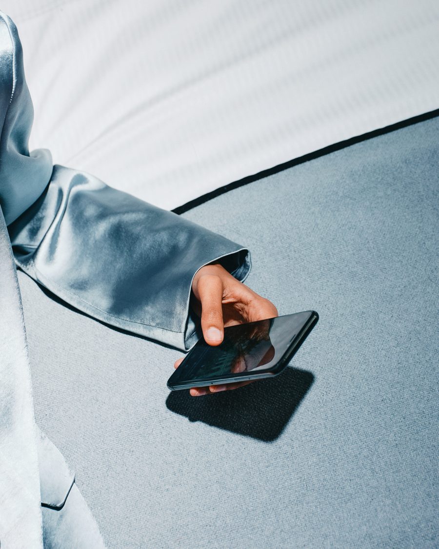 A member checking an offer on the phone