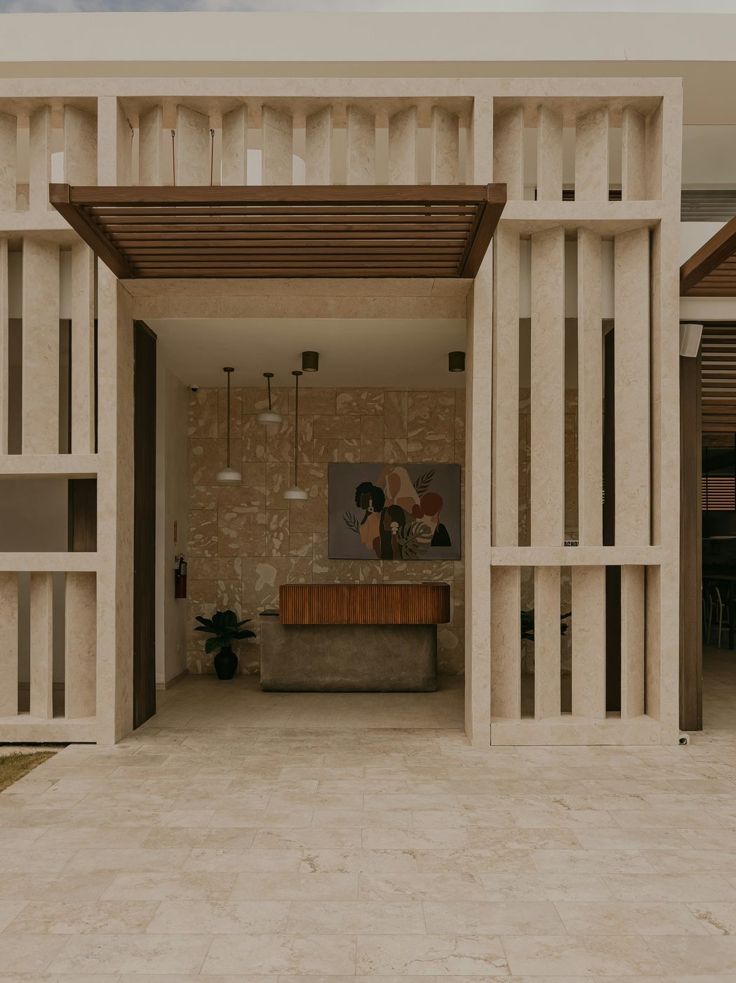 A hotel reception, seen from the courtyard