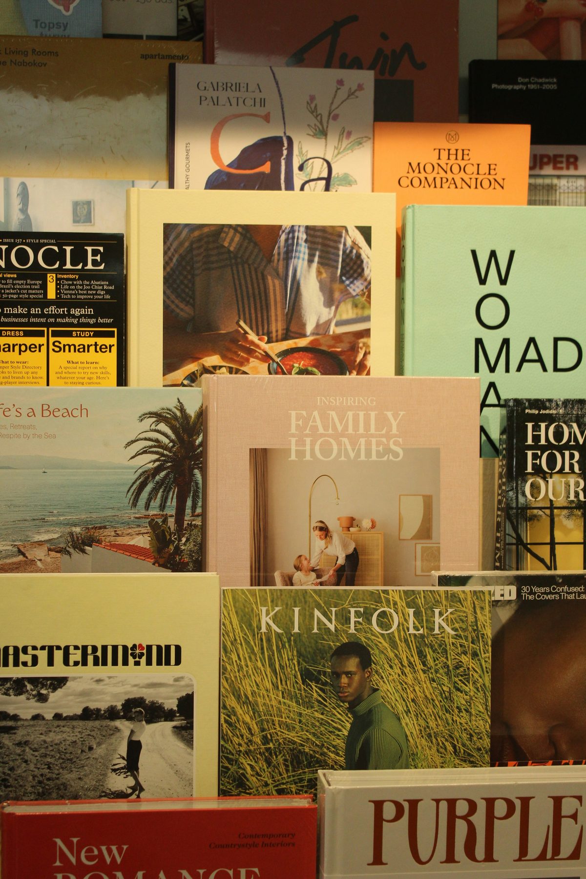 Magazines and books on a shelf